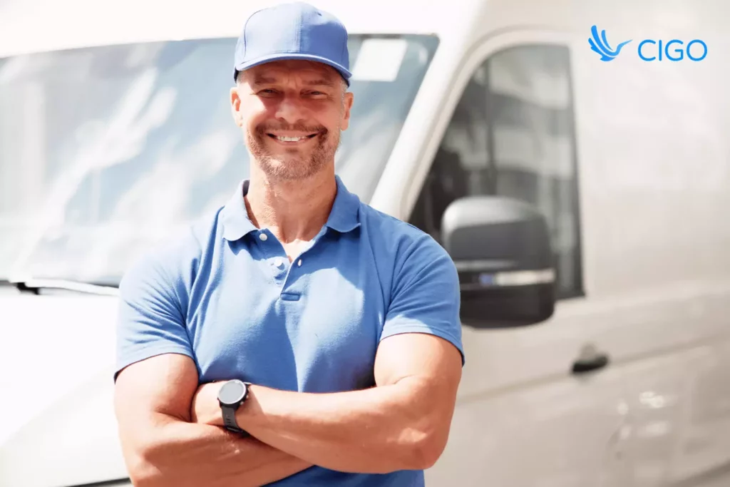 Delivery driver standing in front of van showing confidence in chosen integration approach