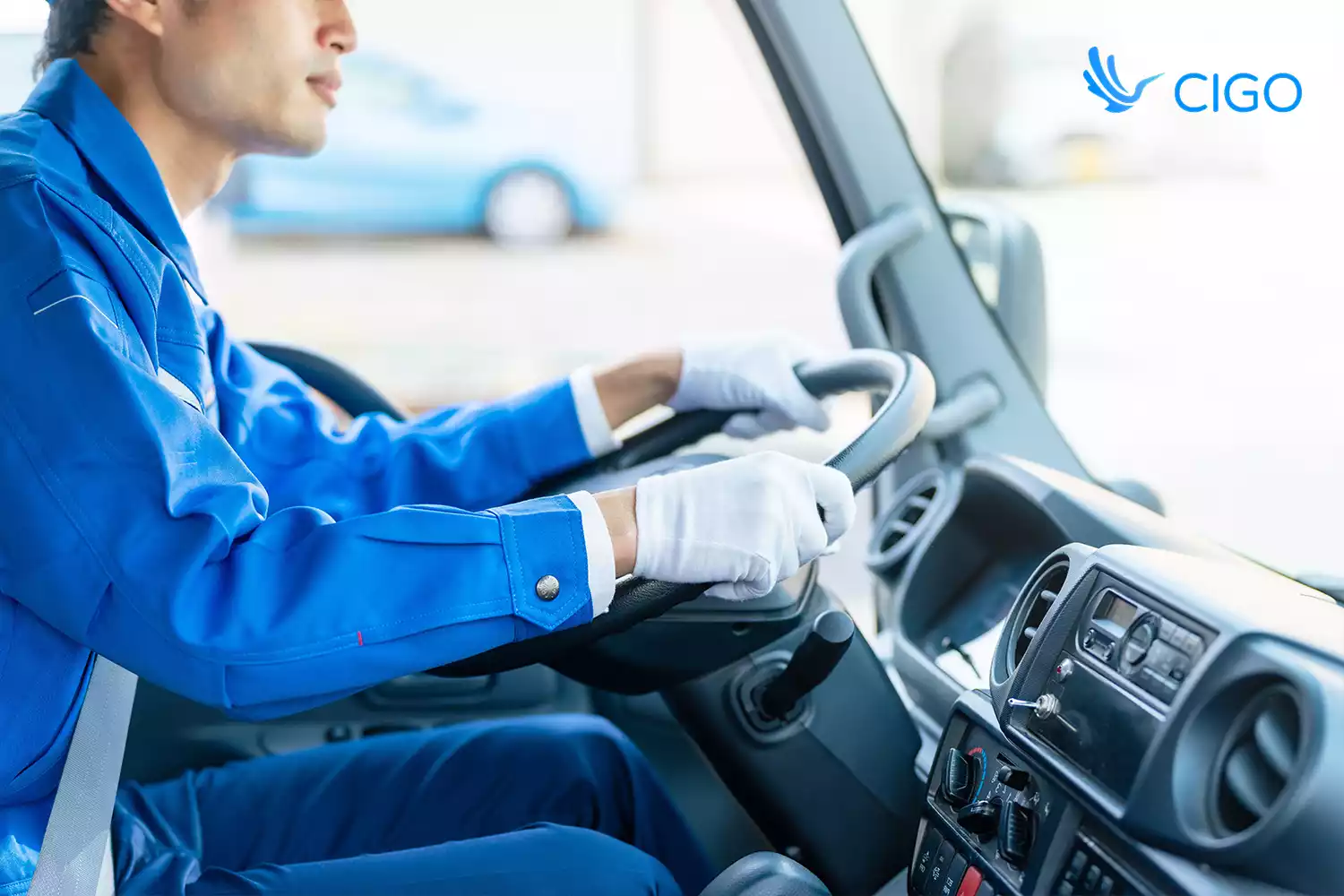 Delivery driver in a truck cab 