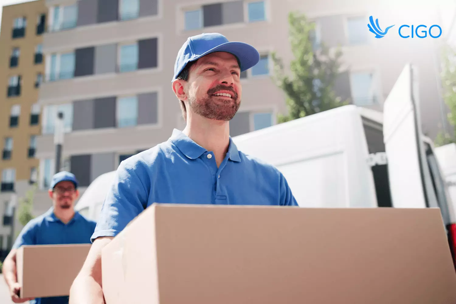 Couriers delivering packages, supporting the best fleet GPS tracking software for on-time routes