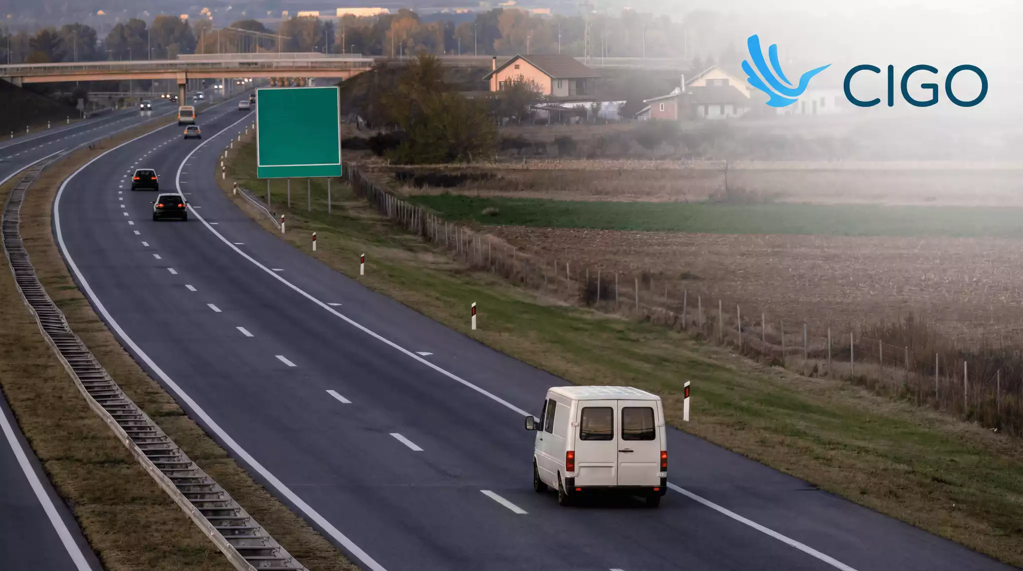 Delivery van traveling on a highway, representing live route progress and ETA tracking