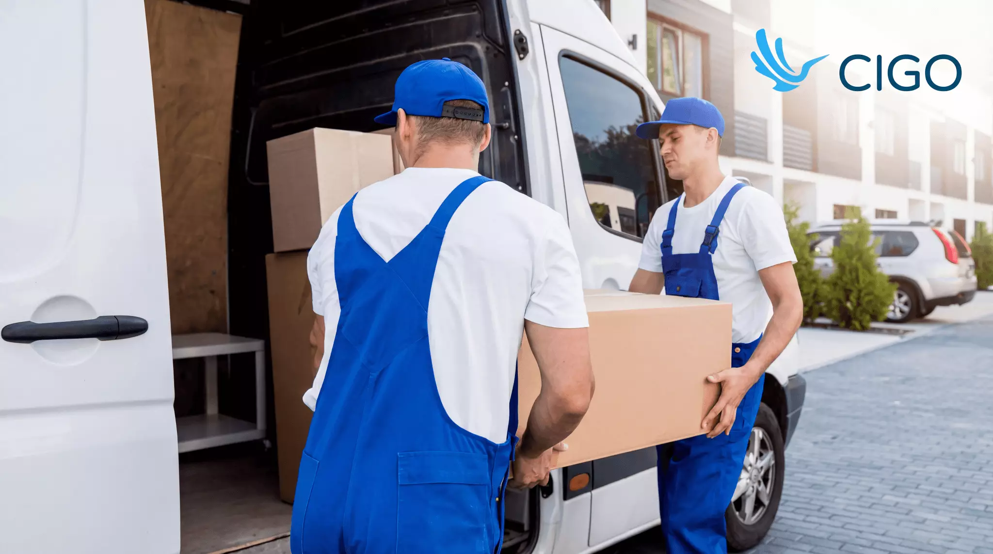 Delivery drivers completing a stop with coordinated handoff and consistent route status updates