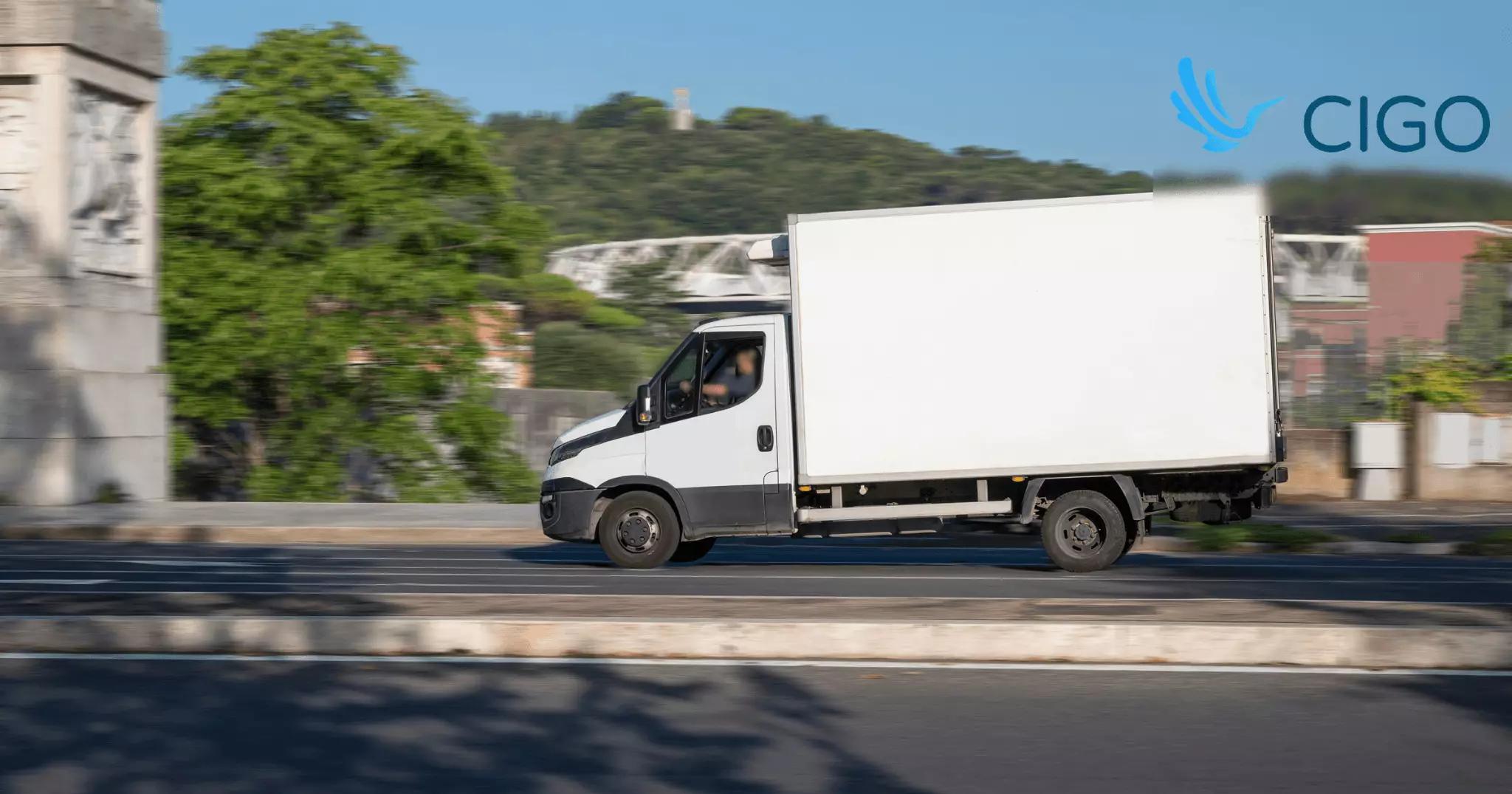 White fleet delivery truck on capacity-managed last-mile route