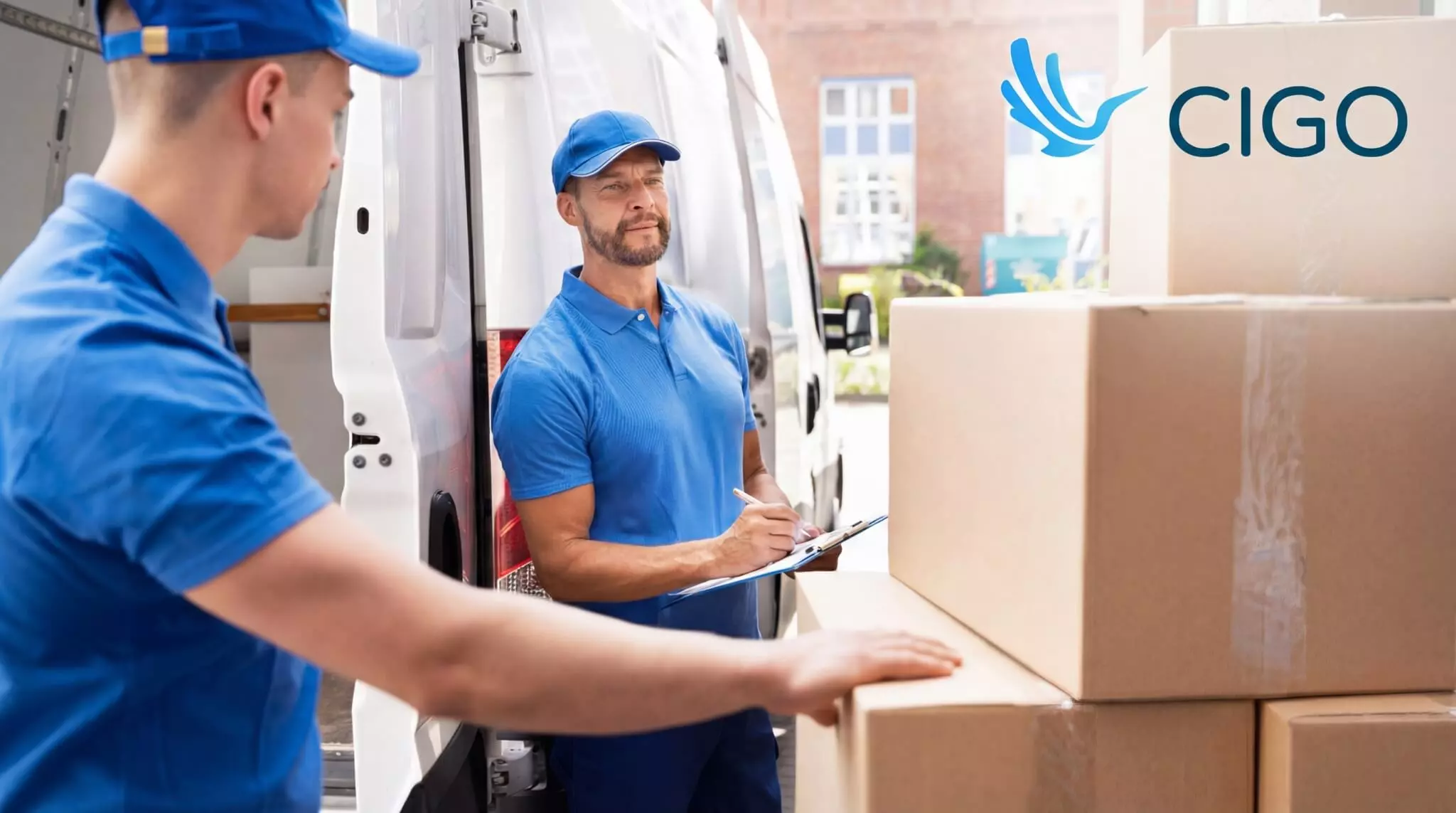 Delivery drivers verifying stop details and recording proof as part of route tracking execution