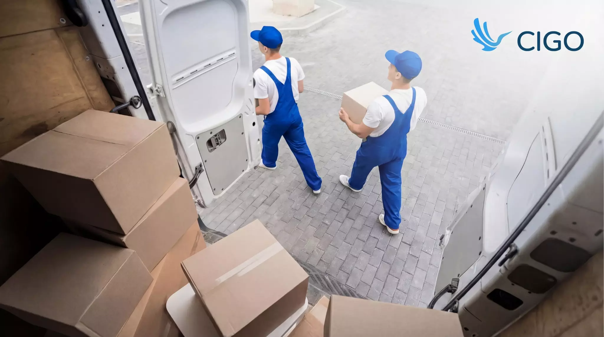 Drivers unload packages from a van for efficient multi-stop last-mile delivery